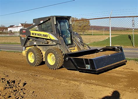 skid steer rake attachments|rock attachment for skid steer.